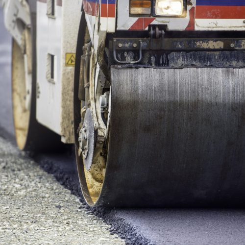 Heavy Vibration roller compactor at asphalt pavement works for road and highway construction