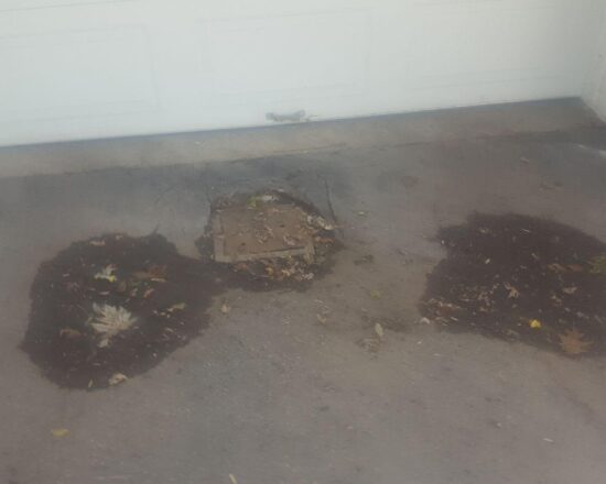 reparer drain garage